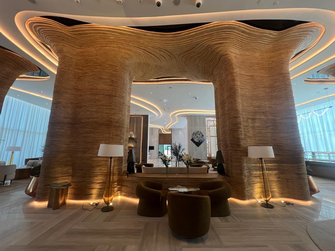 Premium interior with sculptural timber feature and integrated lighting